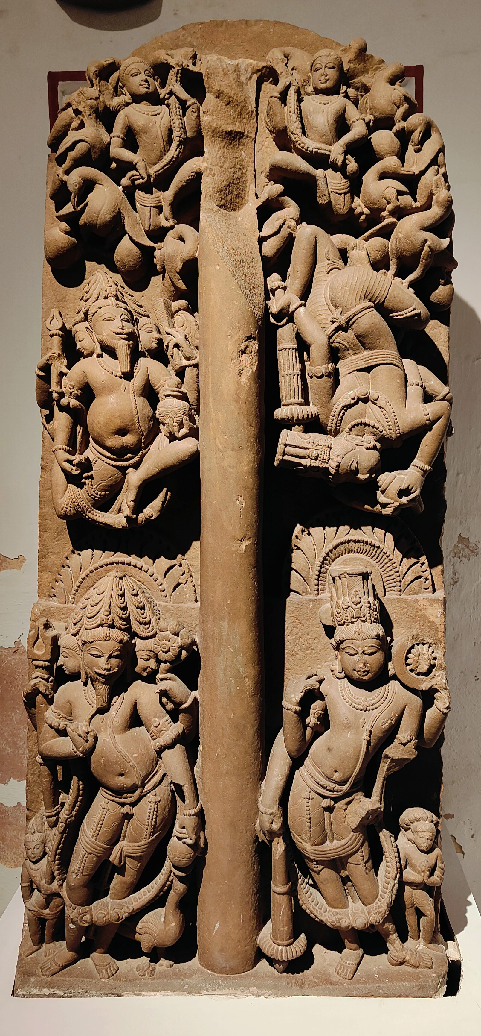 Image 8: This is a depiction of Shiva in the form of lingodhbhav-murti. Stella Kramrisch described this particular image from Harsha: ‘In the universal night, the pillar, there was nothing; a fiery pillar appeared above the waters. Other than that, it had no beginning, no end. Brahma flew into the empyrean and failed to reach its top; Vishnu dove into the sea's depths and failed to find its bottom. The two gods then submit, becoming the fiery pillar's acolytes.