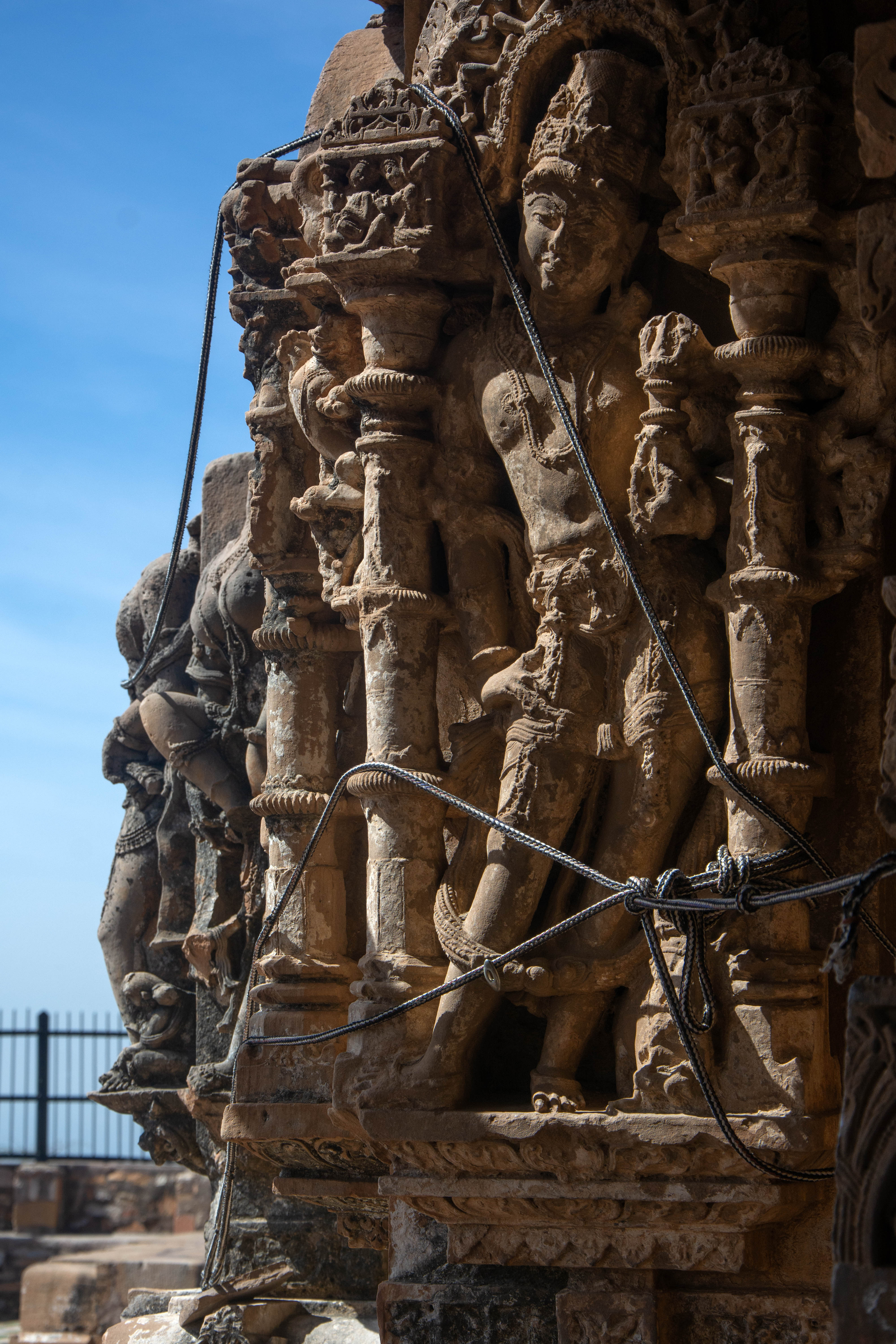 The eastern face of the Harshnath Temple wall depicts dikpala Indra holding a vajra in his left hand.