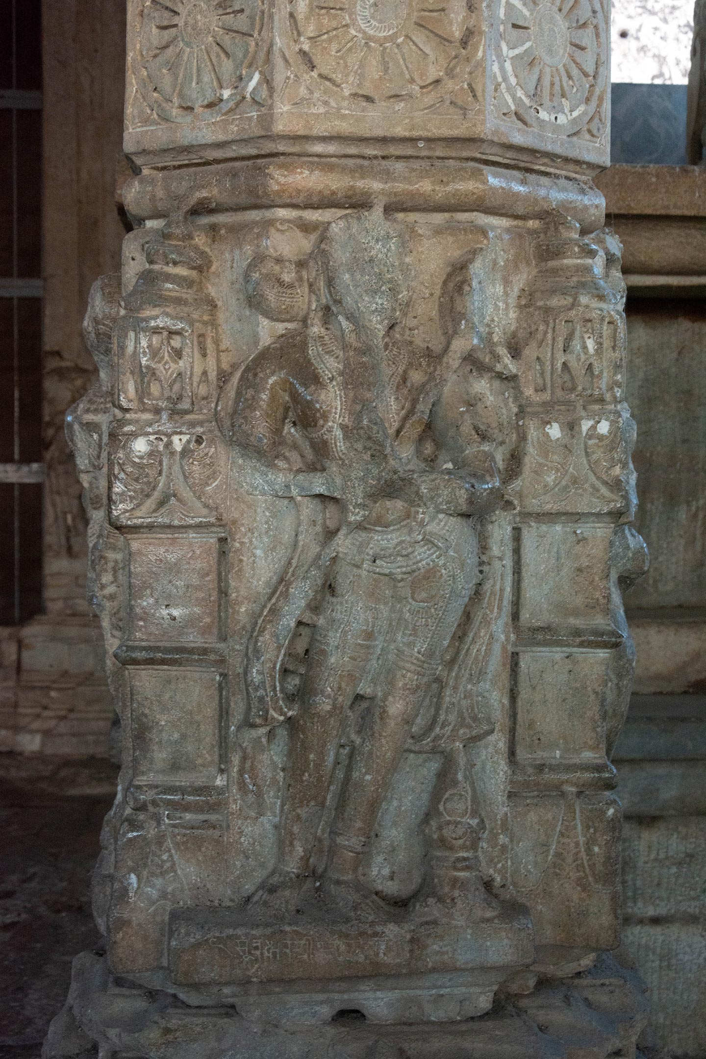 Image 7: A heavily adorned royal figure, depicted in the tribhanga pose, exhibits damaged hands. Whether this represents the patron, King Vigraharaja IV, remains a matter of pure speculation.
