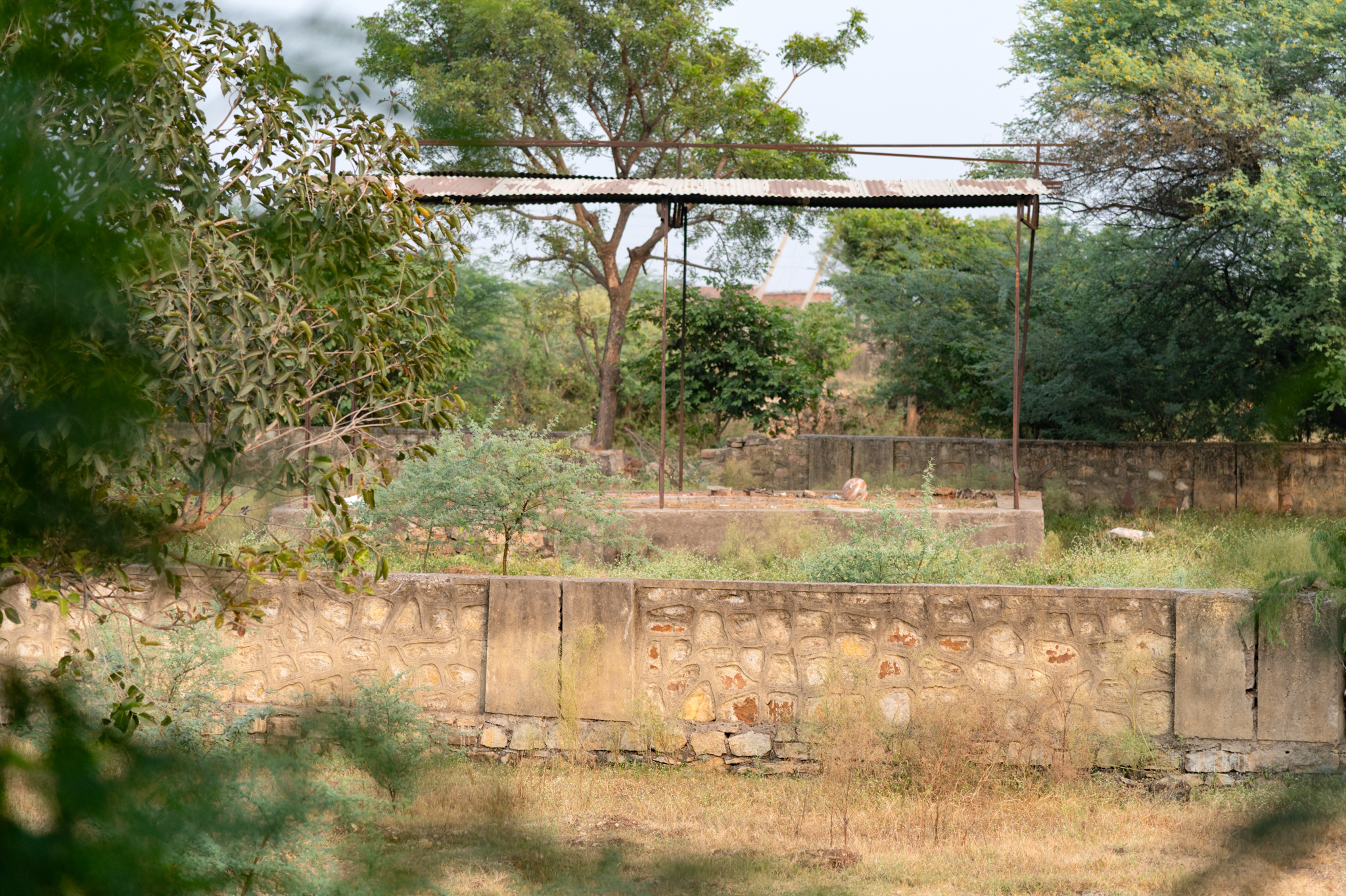 A cremation ground is located close to the temple's frontal entrance (west).