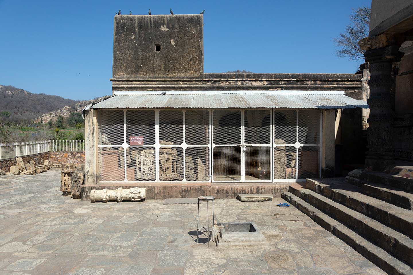 This is the on-site storehouse that houses several architectural elements and sculptural fragments found in Neelkanth Mahadev Temple as well as the entire temple complex. These fragments are important to understand the original fabric of the temple structure.