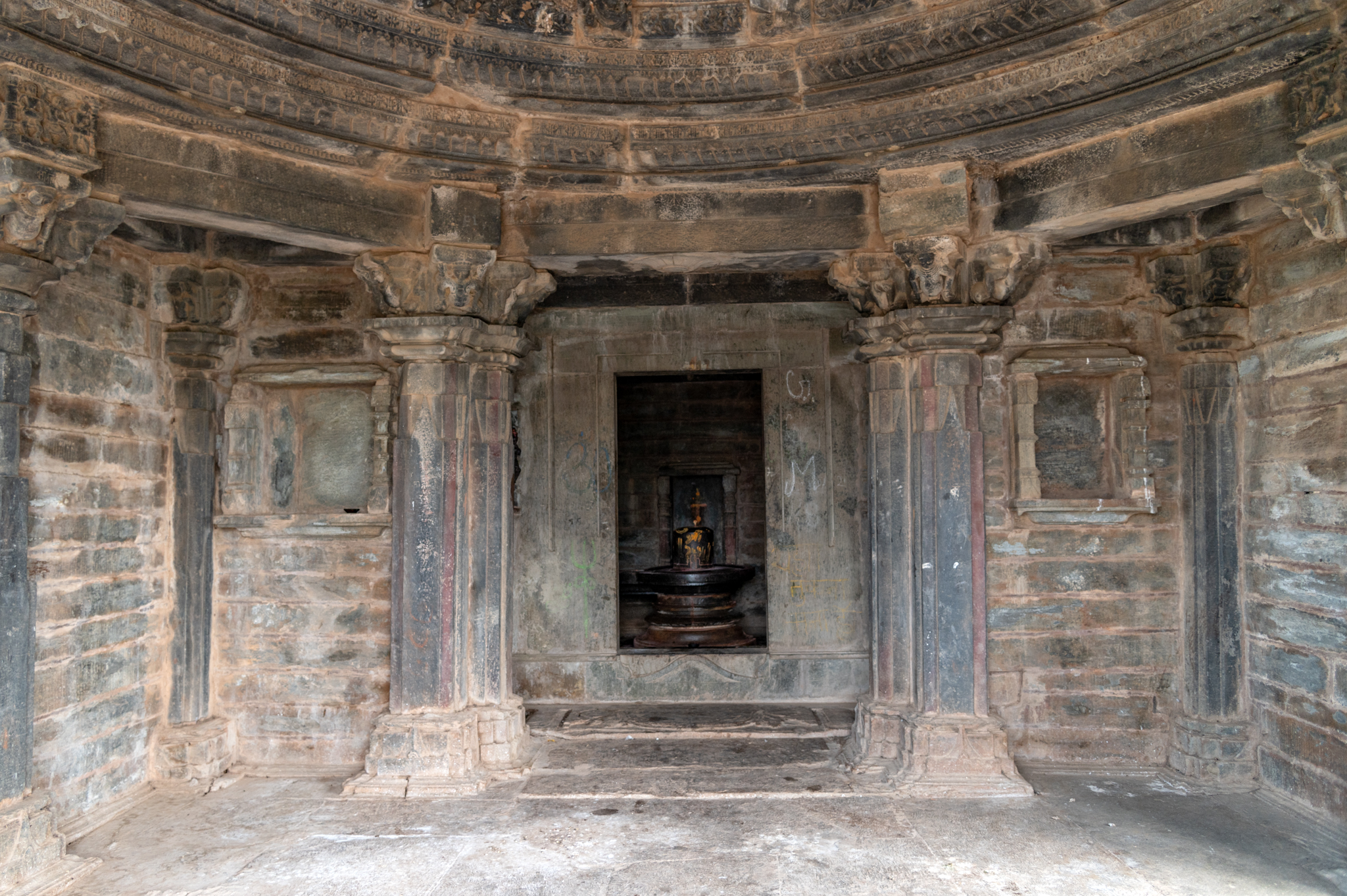 This is the main mandapa (pillared hall) entrance to the Kumbheshwar Mahadev Temple. The mandapa's outer walls have undergone restoration.