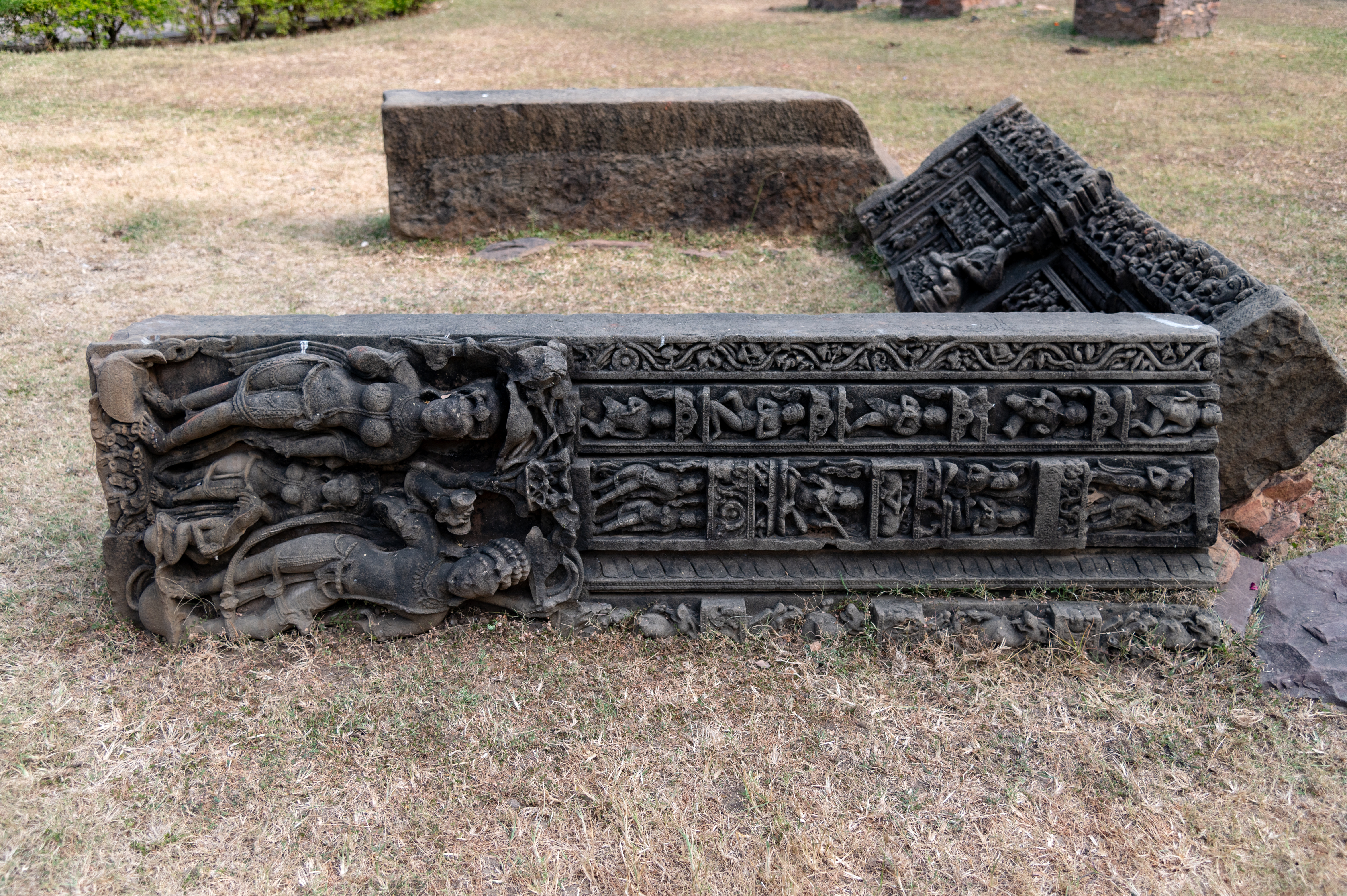 In the Baroli group of temples, remains of an intricately carved doorframe can also be found, very close to the torana (ornamental gateway). The doorframe depicts divine figures which include Shiva, Brahma and Vishnu, along with river goddesses, navagrahas (nine planets), saptamatrikas (seven mother goddesses), and dvarapalas (door guardians).