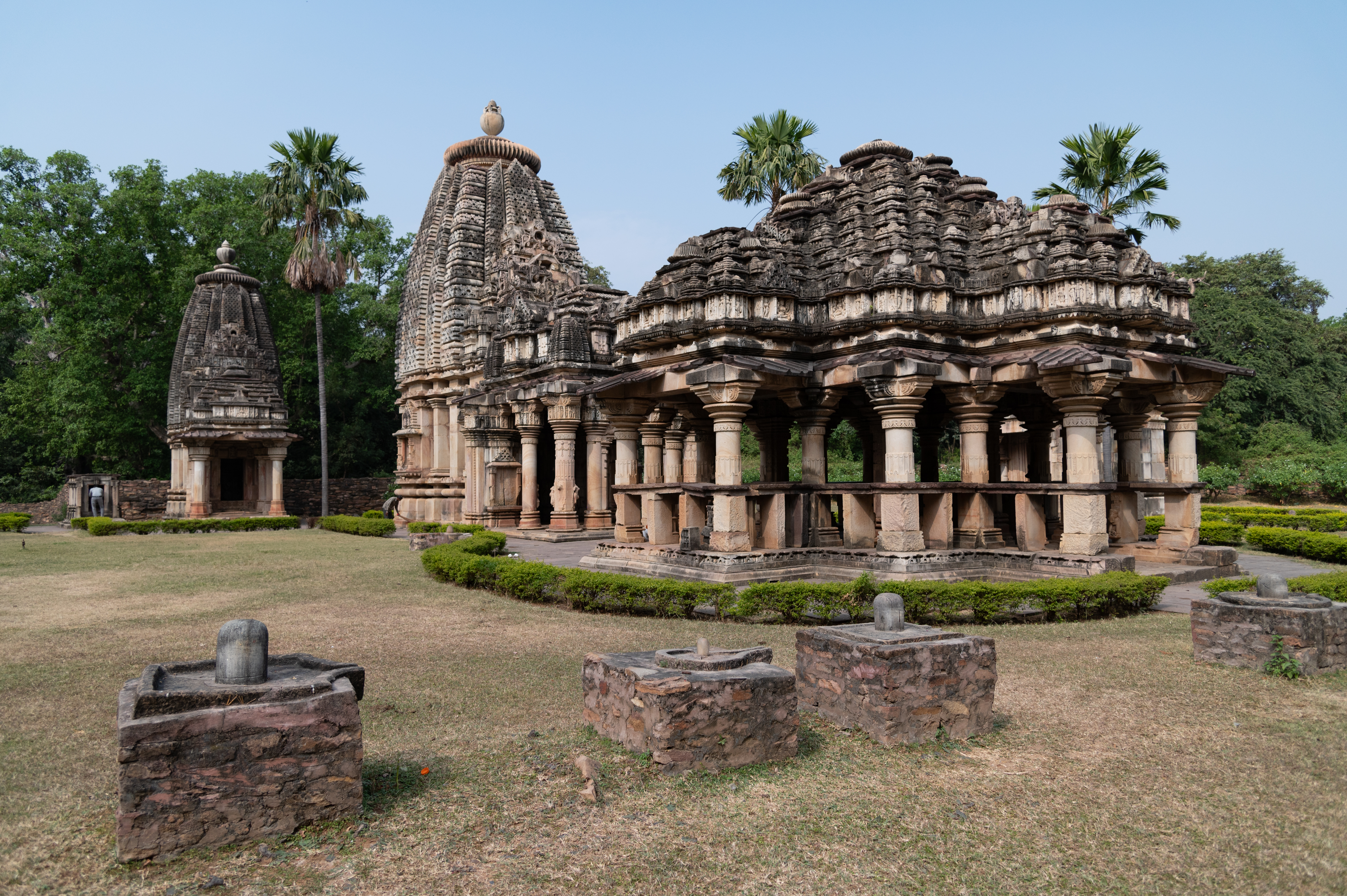 The Ghateshwar Temple consists of a garbhagriha (sanctum sanctorum), antarala (vestibule or antechamber) and a mukhamandapa (front porch) on plan. There is a rangamandapa (an open type of pillared hall used for ceremonial rituals) in front of the temple on the same axis. Both mandapas (pillared hall) feature a phamsana shikhara (pyramidal superstructure), while the garbhagriha has a latina shikhara (mono-spired superstructure).