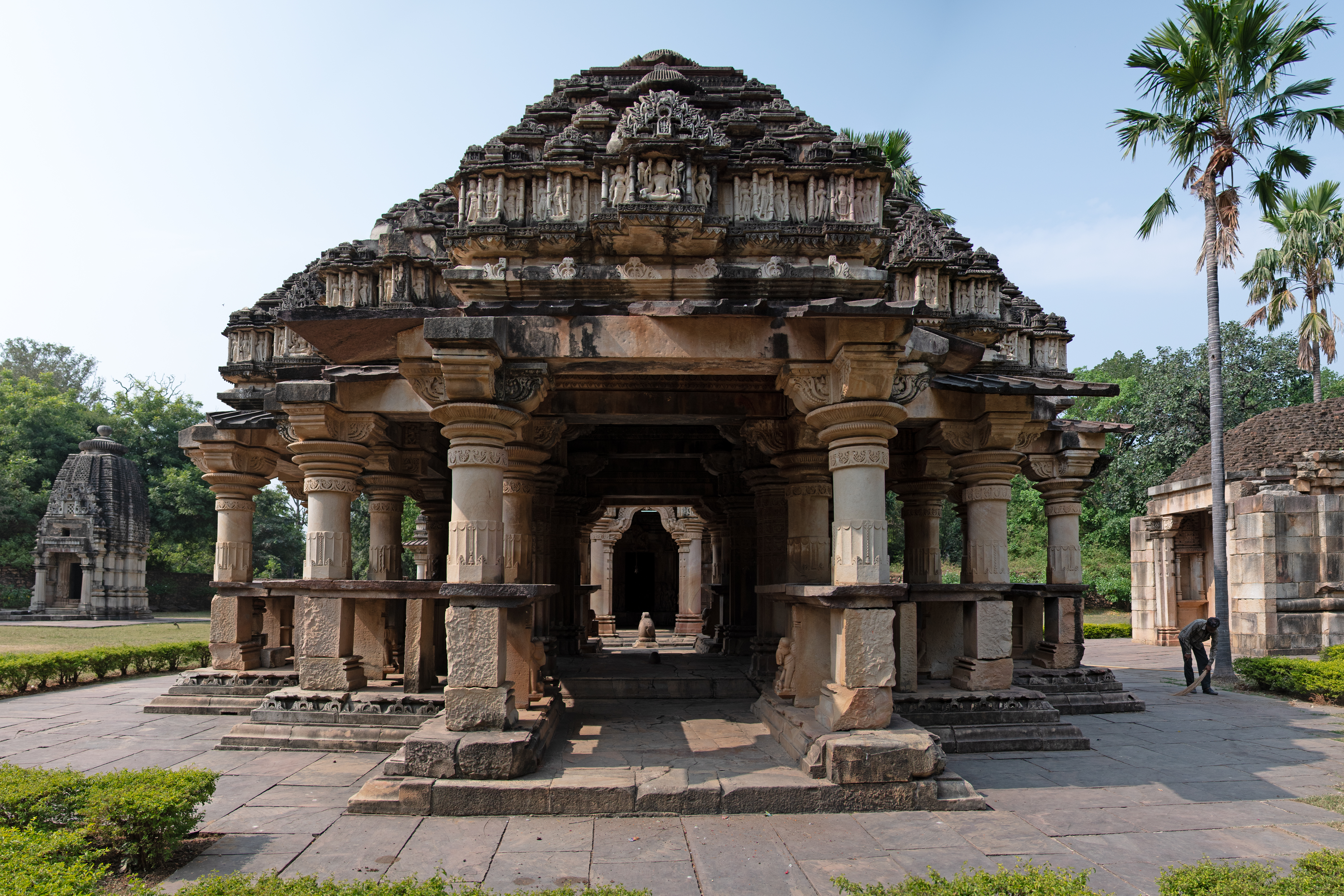 The Ghateshwar Temple has a rangamandapa (open type of pillared hall used for ceremonial rituals) on the eastern end of the east-west axis, which is larger than the mukhamandapa (front porch). The rangamandapa, also known as Shringara Chaori, has low base mouldings on which a large number of pillars stand, supporting the phamsana shikhara (pyramidal superstructure).