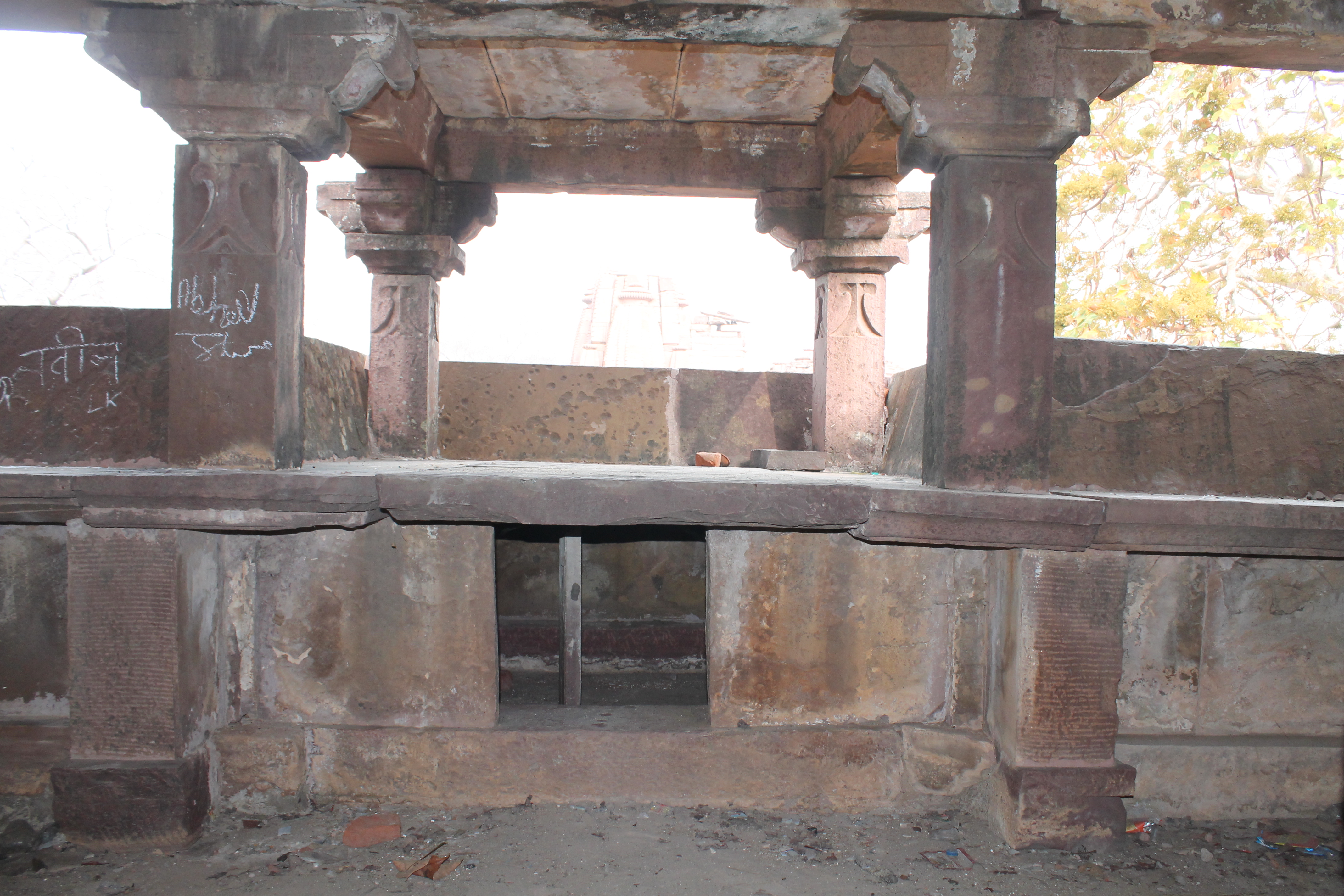 The upper floor of the matha (monastic or residential) in the Suhaveshwar temple complex has a balcony that is right above the mukhamandapa (front porch) on the ground floor. Four pillars support a flat ceiling on this balcony. The balcony's base has an opening that leads to a small room. The layout and style of this balcony are similar to the transepts in the mandapas (pillared halls) of the Suhaveshwar and Mahanaleshwar temples.