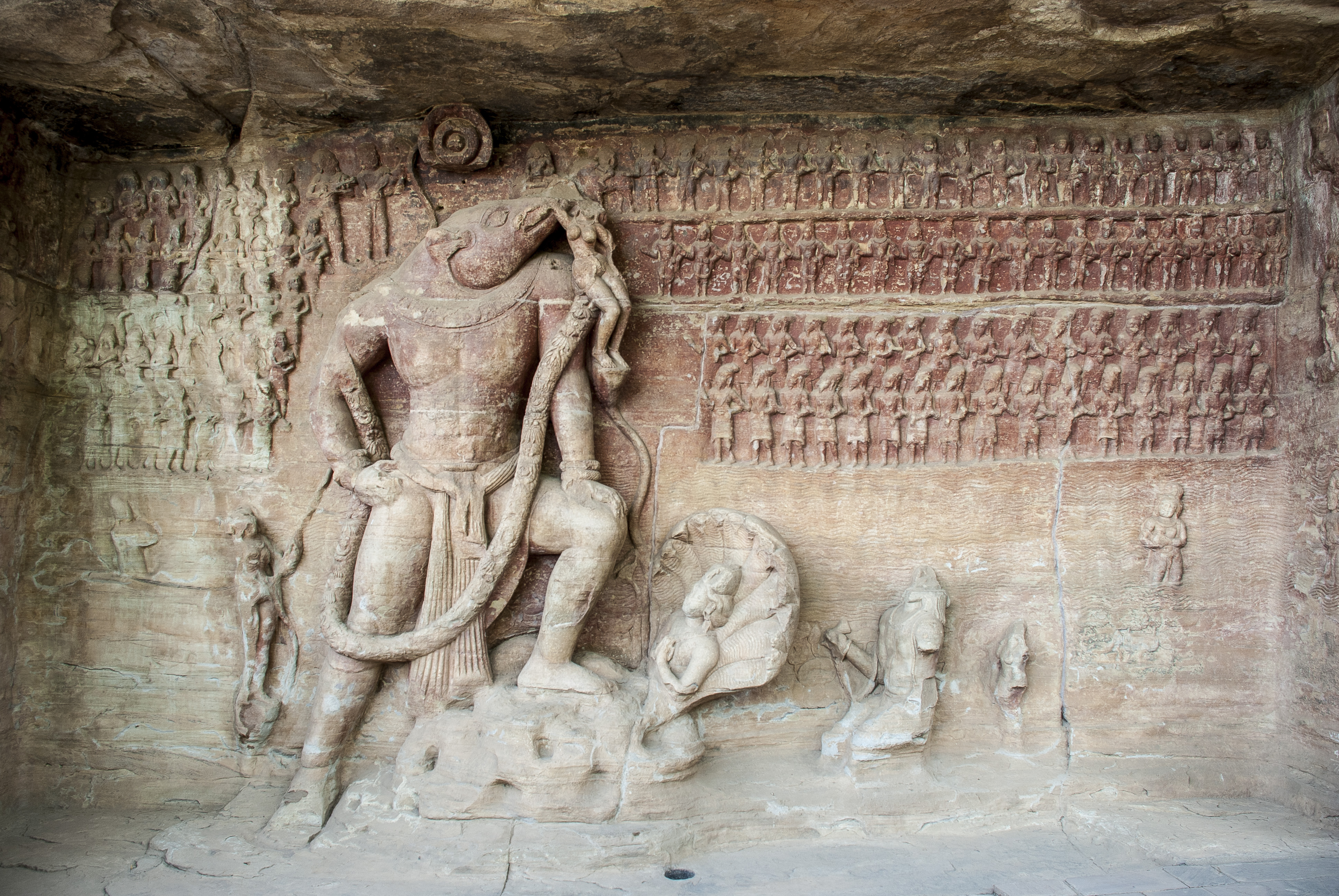 Image 5: Cave 5, in particular, features a complex iconographic program aimed at legitimising the royal patron as the conduit between humanity and the divine, represented by Vishnu in his boar form, while the cosmic waters threatening the human world fill the ground. Image courtesy: Wikimedia Commons